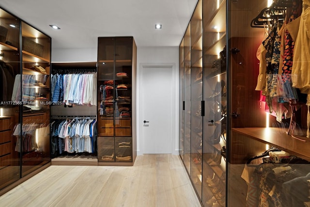 2421 NE 199th St, Miami, FL 33180 - spacious closet featuring wood finished floors