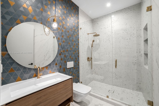 2421 NE 199th St, Miami, FL 33180 - full bath featuring tile walls, marble finish floor, toilet, and a stall shower