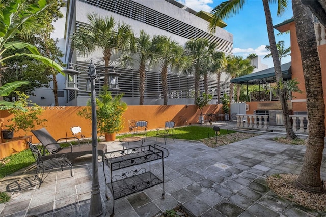 view of patio / terrace with a gazebo and fence