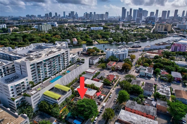 drone / aerial view with a water view and a view of city