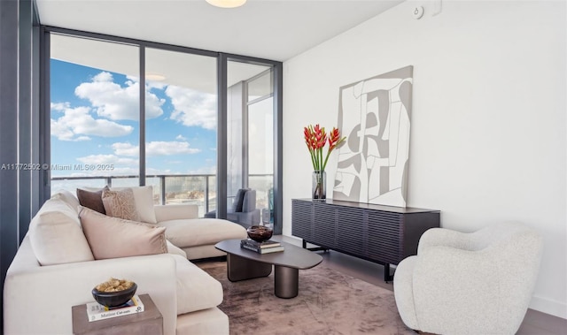 living area with a wall of windows