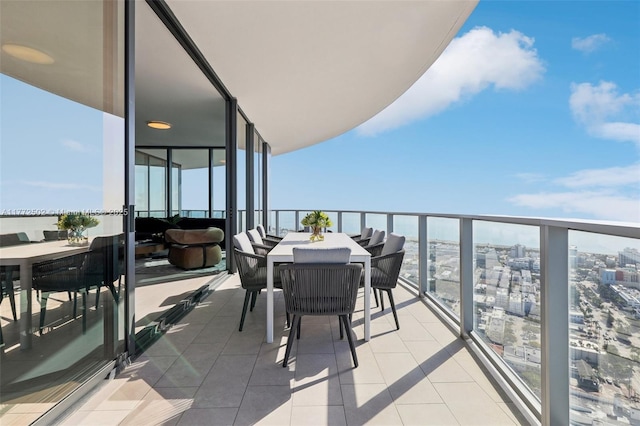 balcony with outdoor dining area