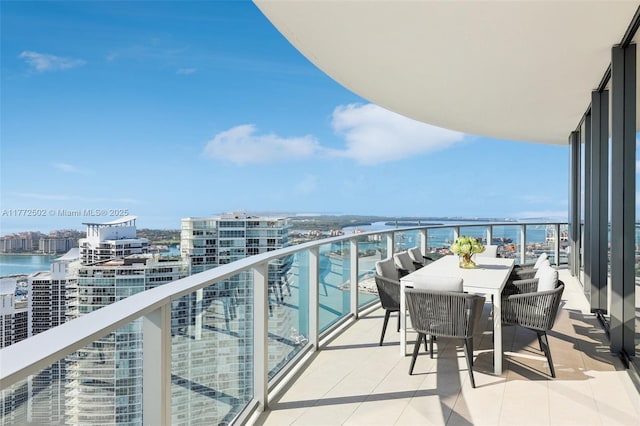 balcony featuring a water view