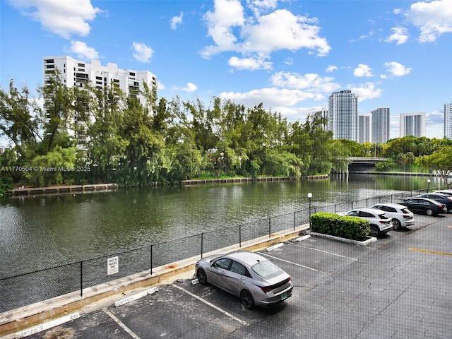 300 Diplomat Pkwy Unit 204, Hallandale Beach, FL 33009 - water view with fence and a view of city