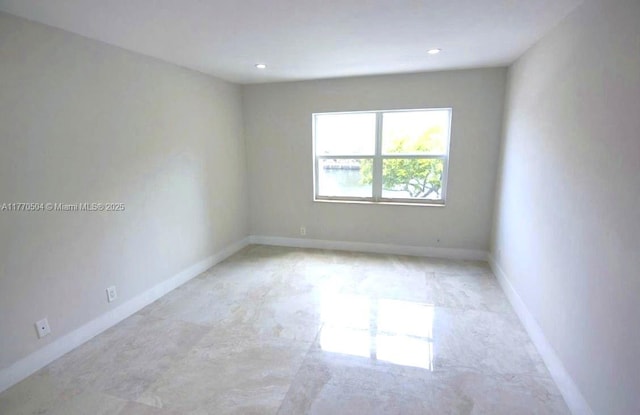300 Diplomat Pkwy Unit 204, Hallandale Beach, FL 33009 - empty room with baseboards and recessed lighting