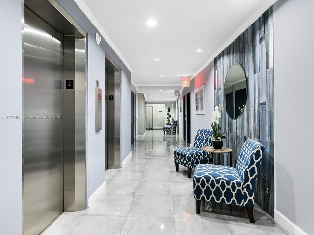 300 Diplomat Pkwy Unit 204, Hallandale Beach, FL 33009 - corridor with elevator, recessed lighting, crown molding, and baseboards
