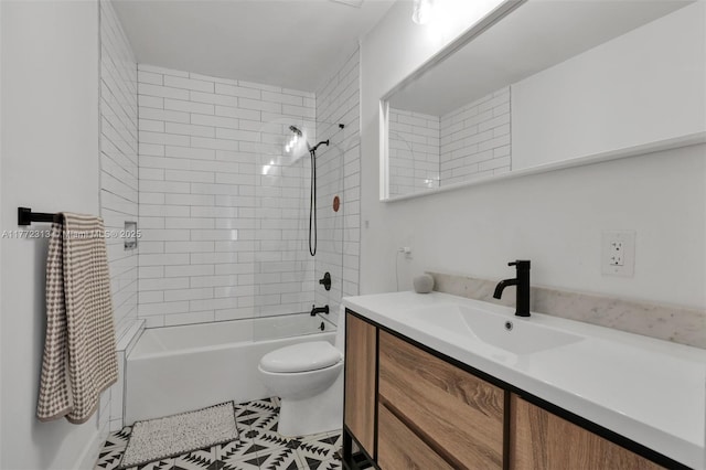 full bath featuring toilet, vanity, and shower / washtub combination