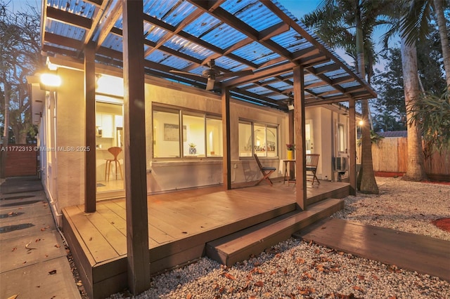 wooden deck with fence and a pergola