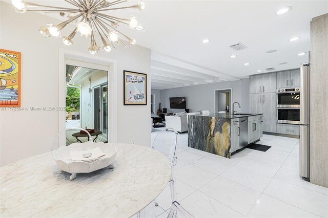 dining area with visible vents, a chandelier, recessed lighting, and light tile patterned floors