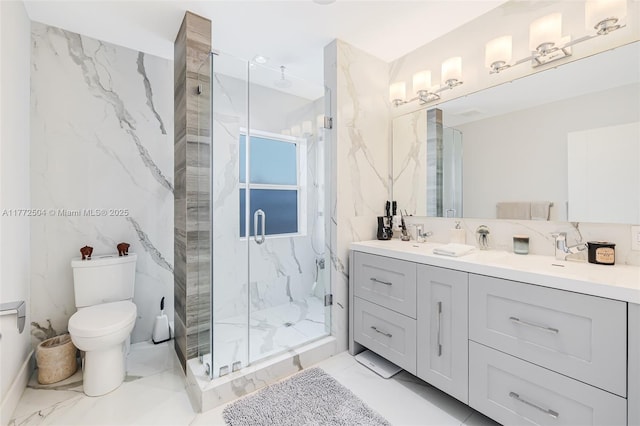 full bath featuring marble finish floor, double vanity, a marble finish shower, toilet, and a sink