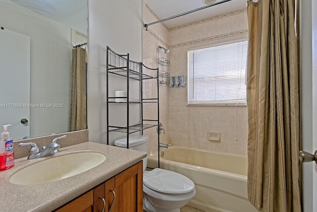 bathroom with toilet, shower / bath combo with shower curtain, and vanity