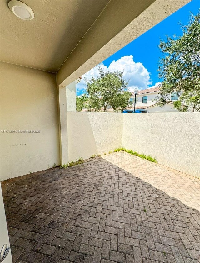 3210 NW 126th Ave Unit 3210, Sunrise, FL 33323 - view of patio featuring fence