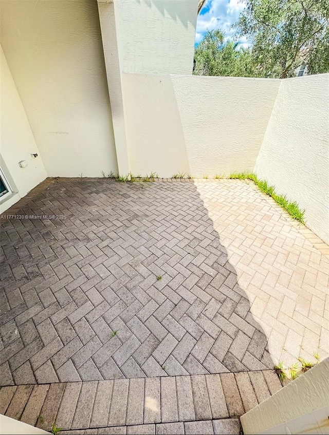 3210 NW 126th Ave Unit 3210, Sunrise, FL 33323 - view of patio featuring fence