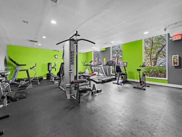 gym with visible vents, recessed lighting, and baseboards