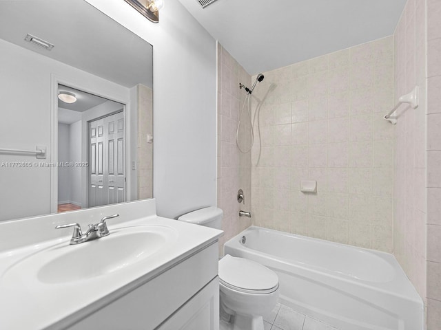 full bathroom with vanity, bathing tub / shower combination, toilet, visible vents, and tile patterned flooring