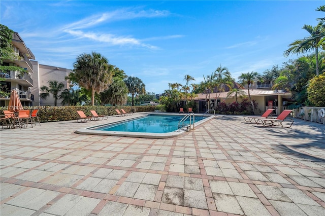 community pool featuring a patio