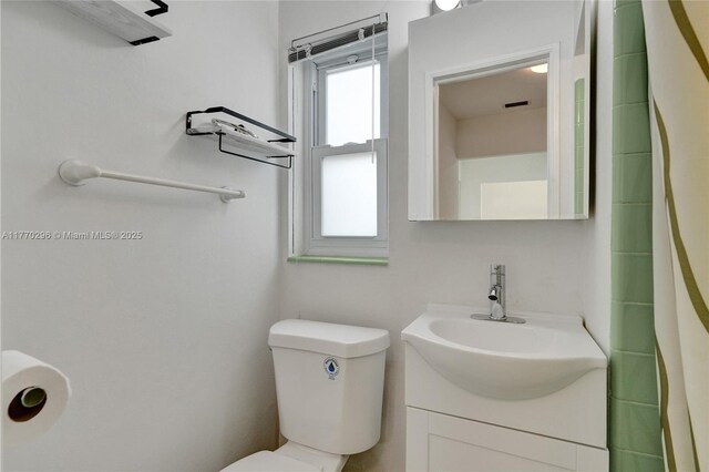 2125 Alamanda Dr, North Miami, FL 33181 - bathroom featuring toilet and vanity