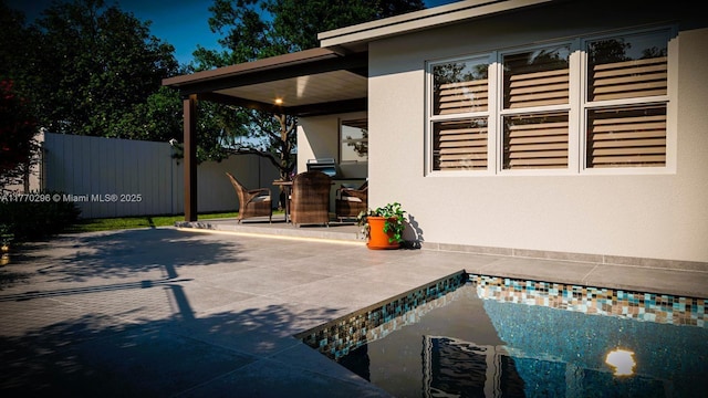 view of patio with fence