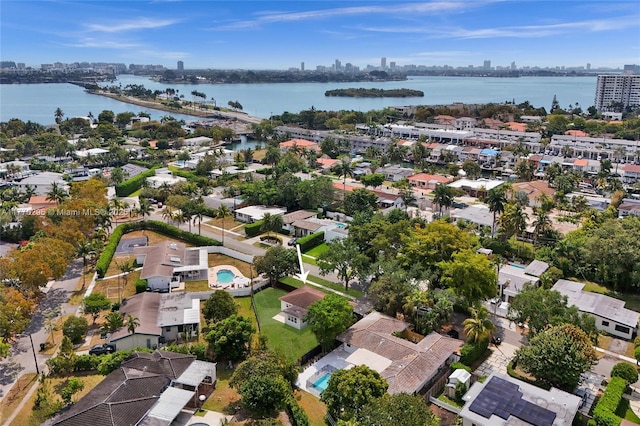 bird's eye view with a water view and a view of city