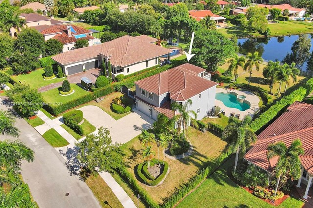 721 Ranch Rd, Weston, FL 33326 - aerial perspective of suburban area featuring a nearby body of water and a pool