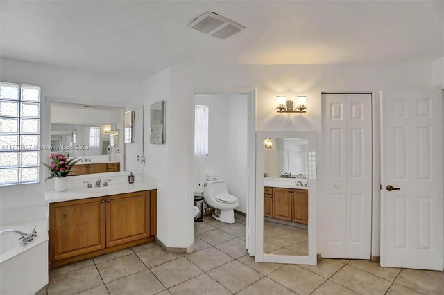 721 Ranch Rd, Weston, FL 33326 - full bath with two vanities, tile patterned floors, and a bath