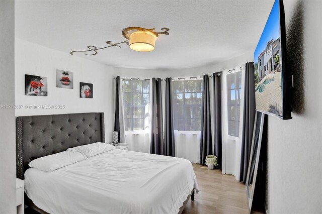 721 Ranch Rd, Weston, FL 33326 - bedroom featuring wood finished floors