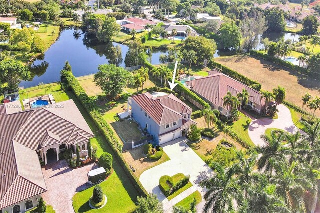 721 Ranch Rd, Weston, FL 33326 - aerial perspective of suburban area with a nearby body of water