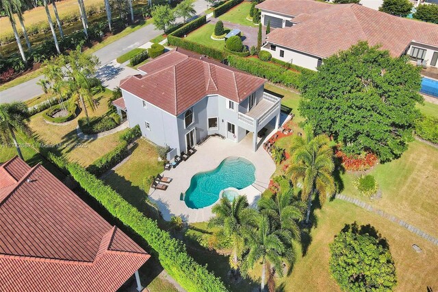 721 Ranch Rd, Weston, FL 33326 - view of subject property with a pool