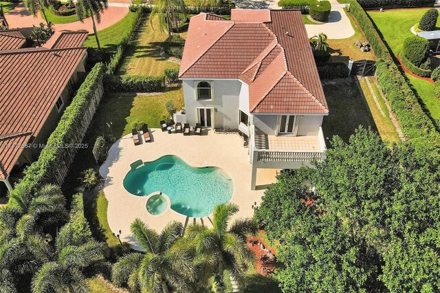 721 Ranch Rd, Weston, FL 33326 - aerial view of property and surrounding area featuring a pool
