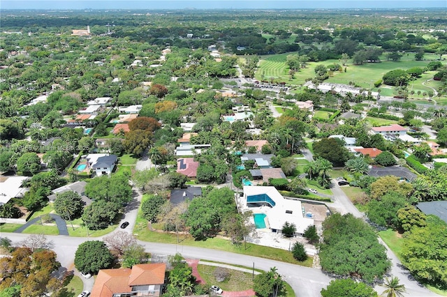 birds eye view of property with a residential view