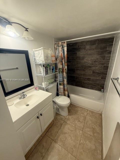 bathroom featuring shower / bath combo, toilet, tile patterned flooring, and vanity