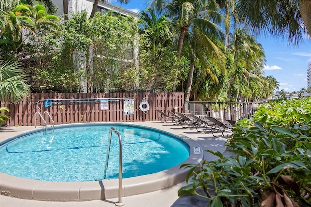 4800 Bayview Dr Unit 402, Fort Lauderdale, FL 33308 - community pool featuring fence and a patio area