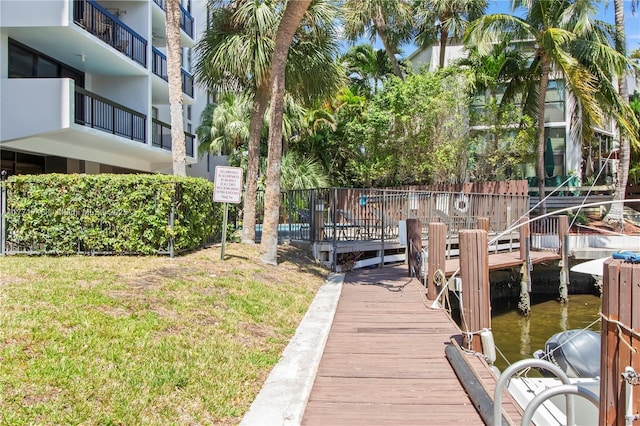 4800 Bayview Dr Unit 402, Fort Lauderdale, FL 33308 - view of dock with a lawn