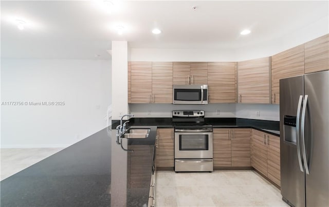 2664 SW 81st Ter Unit 2666, Miramar, FL 33025 - kitchen with stainless steel appliances, dark countertops, and recessed lighting