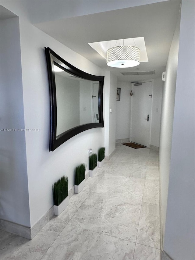 19900 E Country Club Dr Unit 1012, Aventura, FL 33180 - corridor featuring marble finish floor and baseboards
