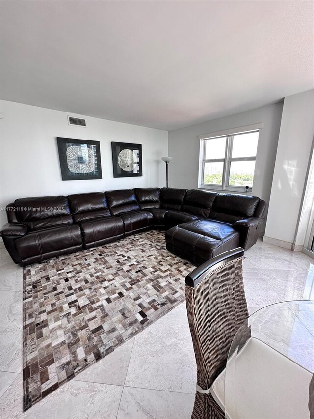 19900 E Country Club Dr Unit 1012, Aventura, FL 33180 - living area with baseboards, marble finish floor, and visible vents