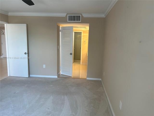5701 Collins Ave Unit 812, Miami Beach, FL 33140 - unfurnished bedroom featuring crown molding and carpet