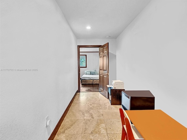 9461 SW 128th St, Miami, FL 33176 - hallway featuring baseboards and stone finish flooring
