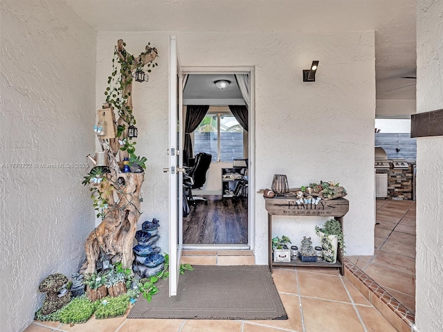 9461 SW 128th St, Miami, FL 33176 - doorway to property with stucco siding and exterior kitchen