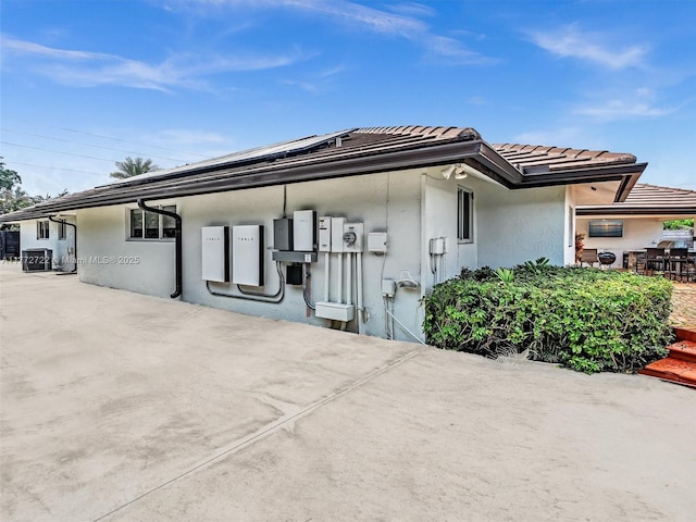 9461 SW 128th St, Miami, FL 33176 - view of home's exterior with stucco siding and a tiled roof