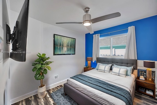 1441 NW 10, Dania Beach, FL 33004 - bedroom featuring baseboards, wood finished floors, and ceiling fan