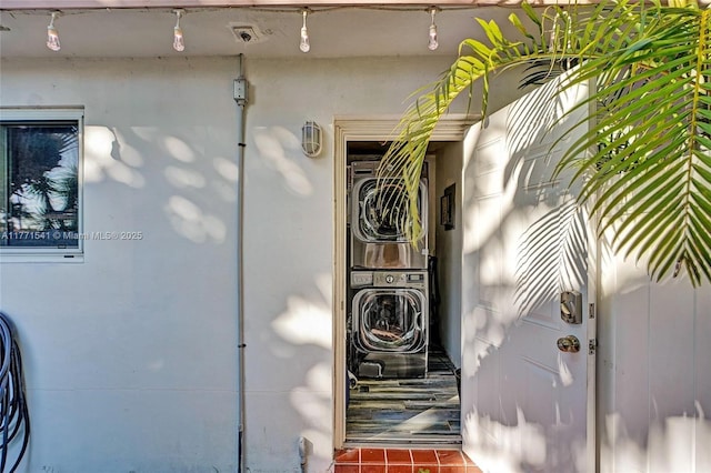 1441 NW 10, Dania Beach, FL 33004 - property entrance with stacked washer / drying machine