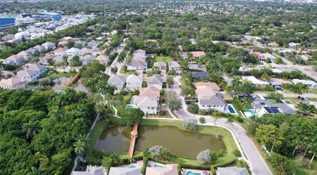 aerial view featuring a residential view and a water view