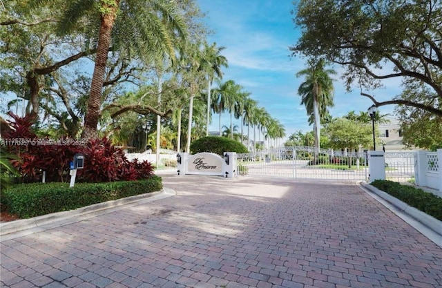 surrounding community with fence and a gate