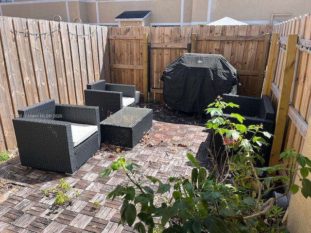 9491 N Palm Cir N Unit 9491, Pembroke Pines, FL 33025 - view of patio featuring fence and area for grilling