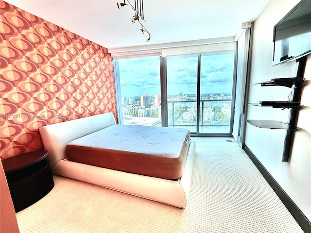 17001 Collins Ave Unit 2508, Sunny Isles Beach, FL 33160 - washroom with washer and dryer, cabinet space, and light tile patterned floors