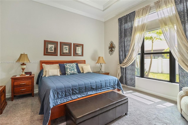 bedroom with baseboards, ornamental molding, carpet flooring, and multiple windows