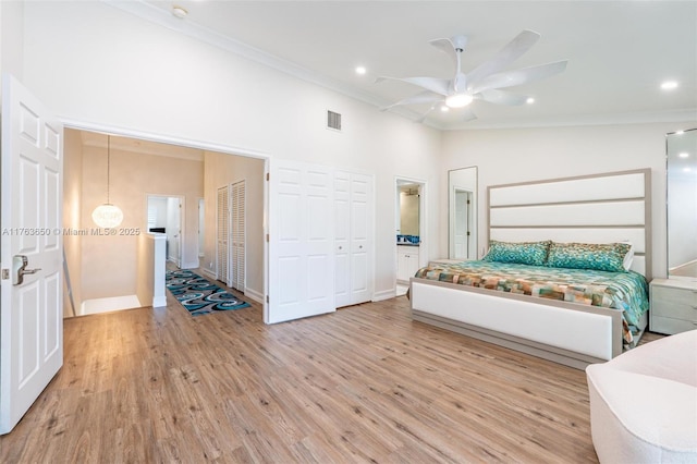 1747 NE 4th Ave Unit F2, Fort Lauderdale, FL 33305 - bedroom with visible vents, light wood-type flooring, and crown molding