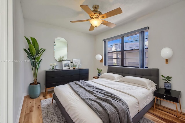 2030 Bayberry Dr Unit 2030, Pembroke Pines, FL 33024 - bedroom featuring light wood-style flooring, baseboards, and ceiling fan