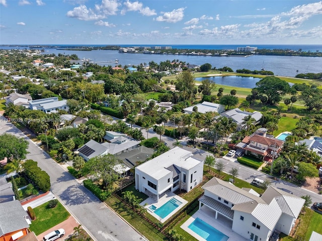 1419 N Lakeside Dr, Lake Worth, FL 33460 - aerial view of residential area with a nearby body of water and a pool